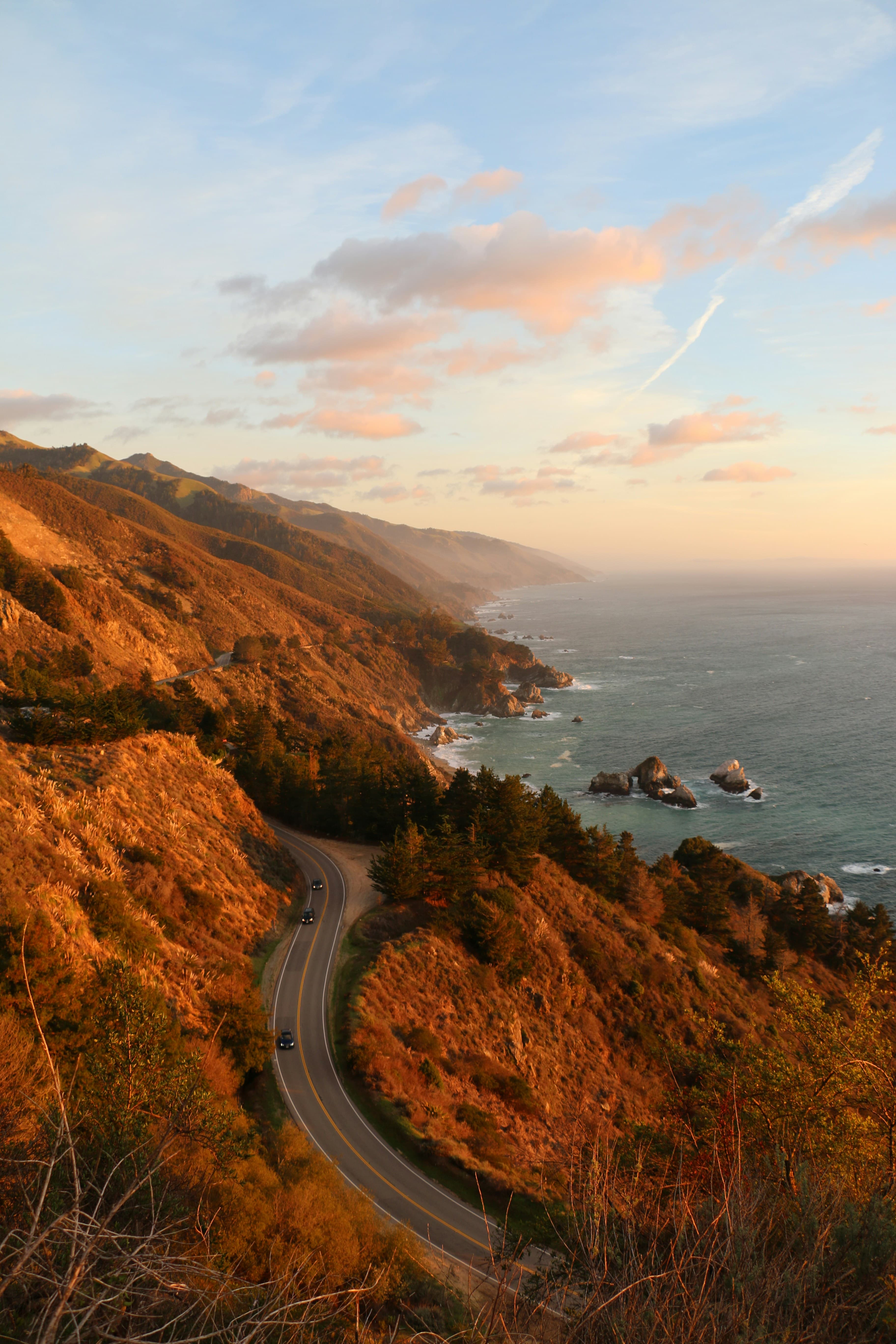 Scenic coastal road winding along the ocean